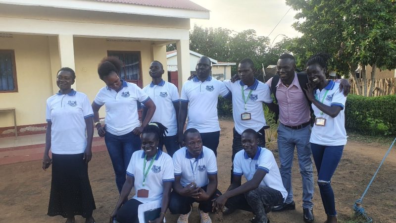 Staff of Rural-Urban SACCO pose for a photo after AGM of 2020 held in Yei